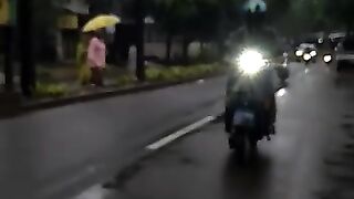 Riding Vespa in the rain..
