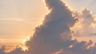Look closely at the clouds... is this a sign? 🌅✨