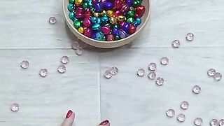 Bells beads stones falling