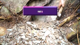 Man Climbing Giant Tree Roots on a Rocky Forest Slope