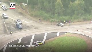 Car drives into large crowd of Australian rugby fans, injuring 10 people north of Sydney