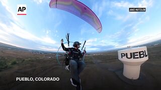 Air traffic controller straps on paramotor to fly to work