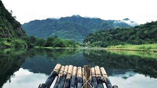 Peaceful Bamboo Raft on Calm River