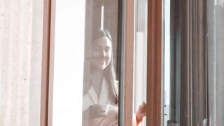 Relaxed Woman Enjoying Sunny Morning At Home With Coffee