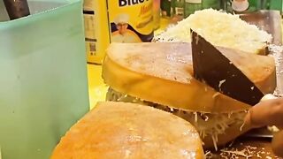 This is called *martabak manis*—the most delicious food in the world. If you like this video, feel free to leave a comment!