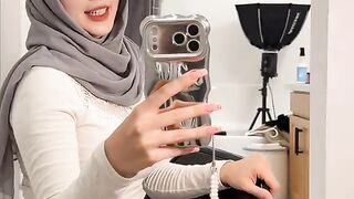 Celva is showing off her new phone.