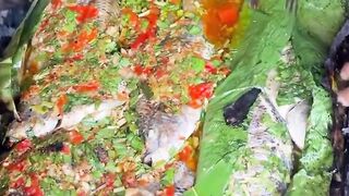 Whole Fish Cooked in Banana Leaves! A Tropical Flavor Explosion