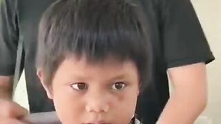 The barber joked with this child