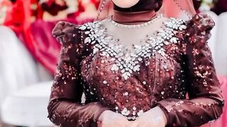Elegant Javanese Bride in Rich Chocolate Brown Wedding Gown