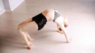Athletic Woman Doing Backbend And Flexibility Training