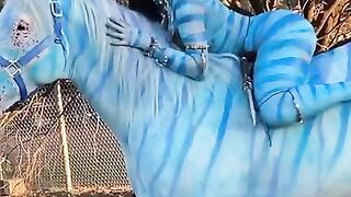 in this video woman wearing  animal skin shape dress and I THINK she wants to show herself that she is looking animal