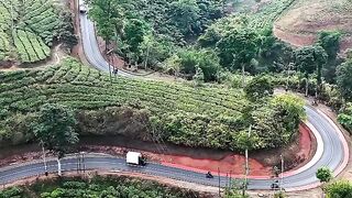 Jalan mulus yang berkelok membelah lanskap sukanagara
