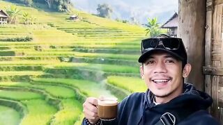 Enjoying the natural rice fields while drinking coffee