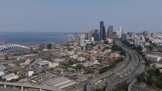 Bustling highways and waterfront.