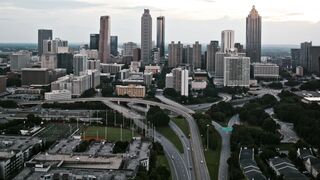 Stunning aerial footage of the Atlanta skyline at sunset.