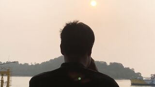 Silhouette of a Person Watching the Sunset