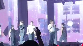 iKON K-Pop Boy Band Performing Live at a Concert