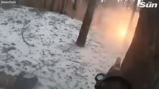 Ukrainian soldiers fire at Russian troops in face-to-face combat on frozen battlefield