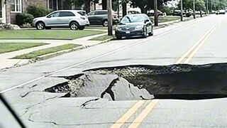 A Massive Sinkhole Suddenly Opens in the Road! 😱