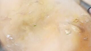 cooking yellow chicken soup
