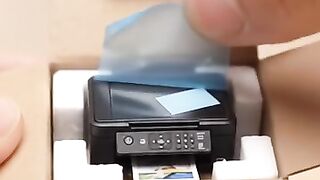 Unboxing mini printer epson