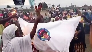 Women burning APC BROOMS