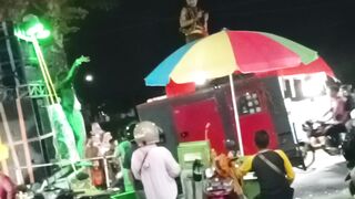 Colorful Carnival Parade with Festive Costumes and Crowds