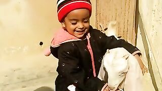 Baby with goat