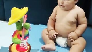 Cute_Babies_Playing_with_Dancing_Cactus
