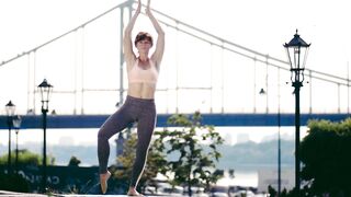 Elegant Yogi Woman Practicing Vriksasana Yoga Balance Outdoors