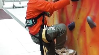 Mario is climbing an alpine wall.