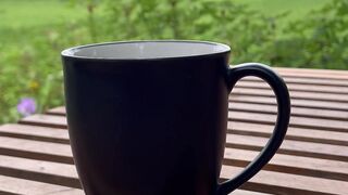 Menikmati Secangkir Kopi Sambil Memandang Keindahan Alam