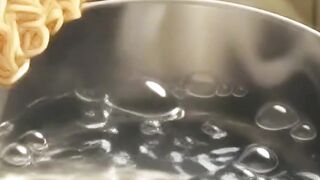 Cooking noodles, egg, and orange juice