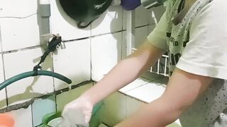 Boy Washing cup and plate