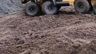 ​Ultimate 6x6 RC Caterpillar Monster Truck Conquering Extreme Mud!