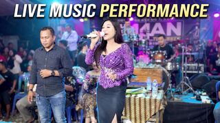 Stunning Live Performance: Beautiful Asian Singer Rocking the Stage with Amazing Vocals