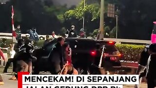 Chaos in Jakarta: Tear Gas and Flames Outside Parliament 🚨🔥