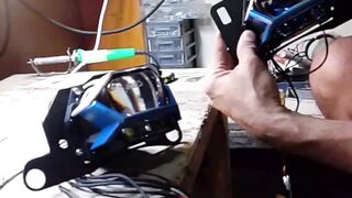Witnessing the motorcycle headlight installation process firsthand.