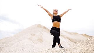 Fit Woman Taking a Deep Breath and Looking Up at the Sky