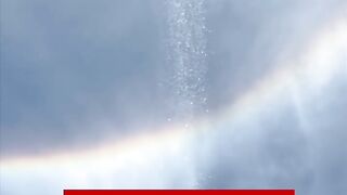 A waterfall appearing to fall from the clouds❤️above Casa de Pedra Cave in São Paulo Brazil❤️❤️