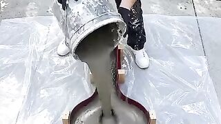 Concrete sink in the shape of a guitar