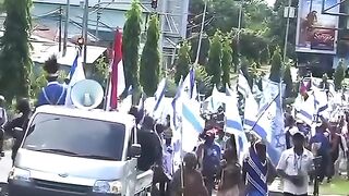 Local Communities Participating in a Large Street Parade in Papua we love ISRAEL