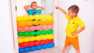 Vlad and Nikita kids play with balloons