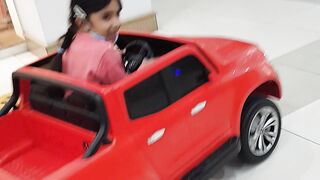 Kids enjoying with car driving in laylpur gallaria faisalabad