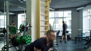 Man Exercising With A Kettlebell