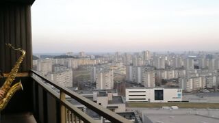 Quarantined Saxophonists Interact Through Their Balconies