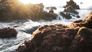 Water Crashing Over the Rock