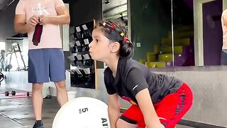 Small body builder lifting weight