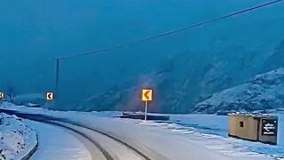 Peaceful road between snow