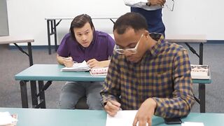 students-cheating-during-an-exam-while-being-observed-by-their-teacher-
